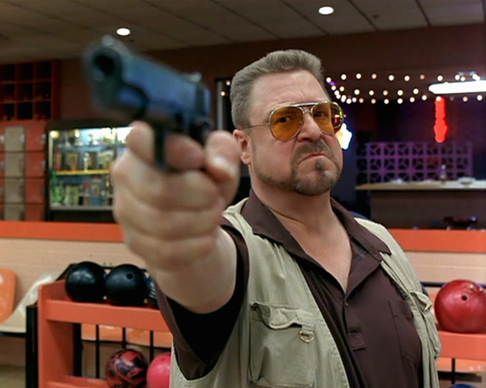 John Goodman as Walter Sobchak in a frame from Coehn sisters' classic: Big Lebowski, when Walter is about to say: Smokey, my friend, you're entering a world of pain.